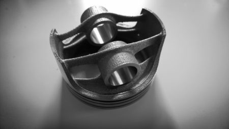 03 - Photo of the final piston design by HardMarque using solidThinking technology and printed using additive manufacturing 3D metal printing. (image courtesy of HardMarque Future Design, all rights reserved).